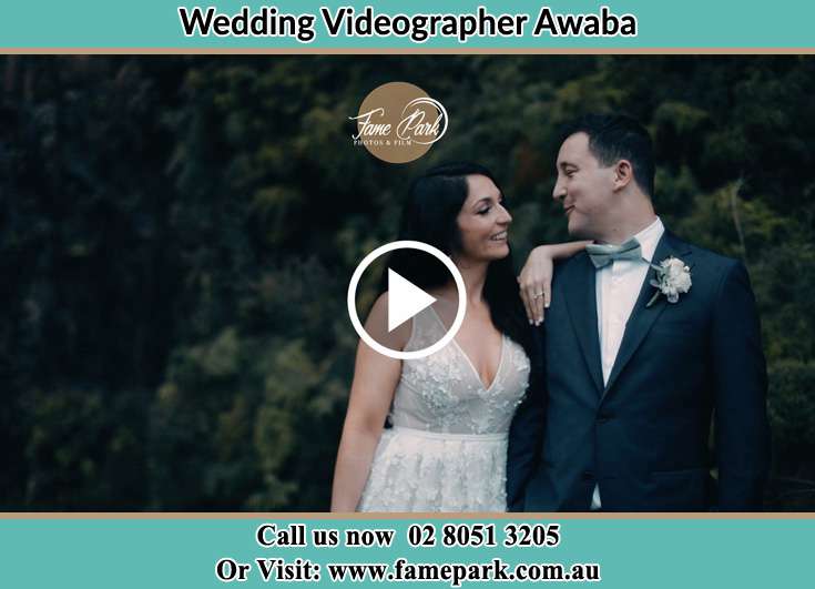 The couple pose for their wedding video Awaba NSW 2283