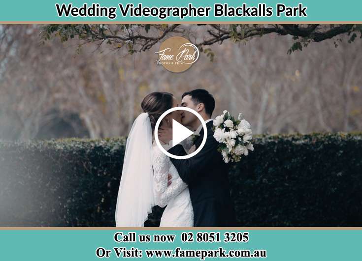 The newly weds kissing Blackalls Park NSW 2283