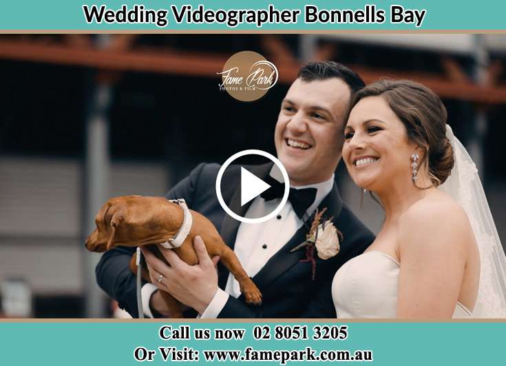 The new couple posed for the camera with their dog Bonnells Bay NSW 2264