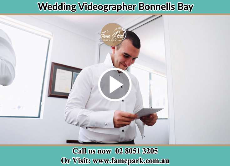 The Groom reading a note Bonnells Bay NSW 2264