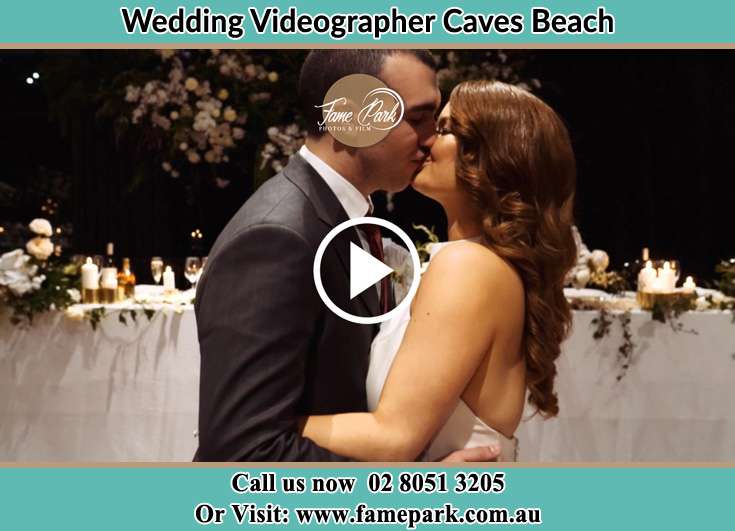 The new couple kissing Caves Beach NSW 2281