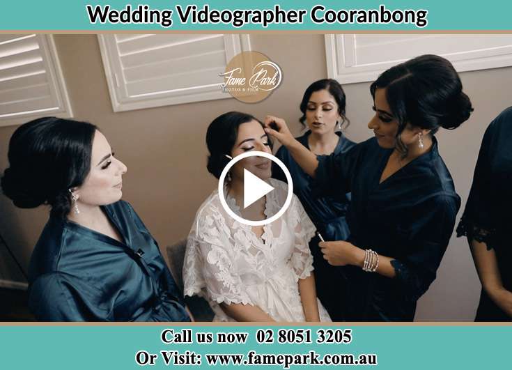 The Bride having a make-up with the help of the makeup artist Cooranbong NSW 2265