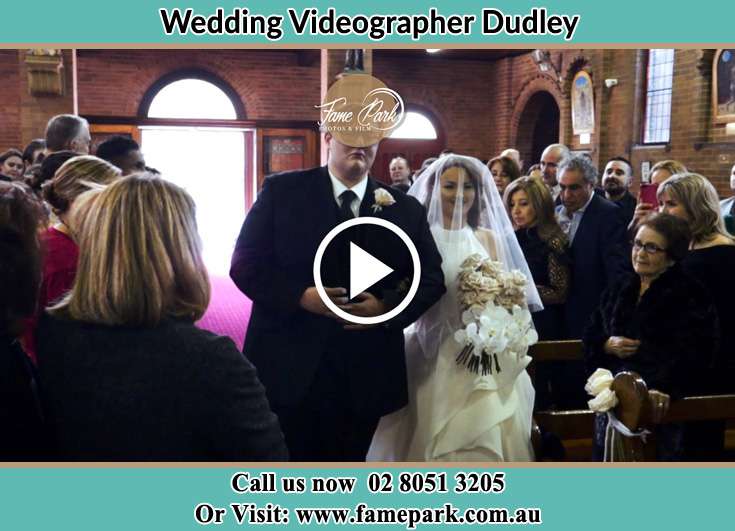 The Bride walking down the aisle with her father Dudley NSW 2290