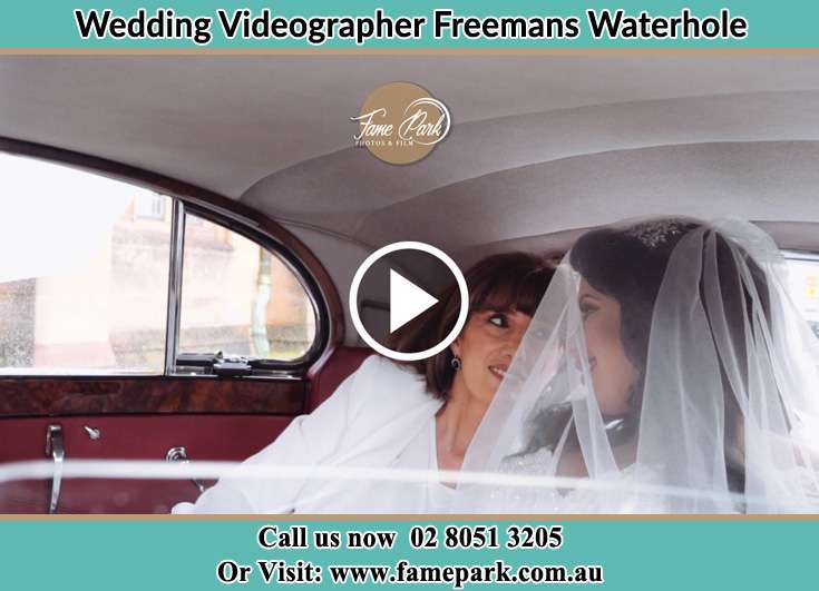 The Bride and her mother inside the wedding car Freemans Waterhole NSW 2323