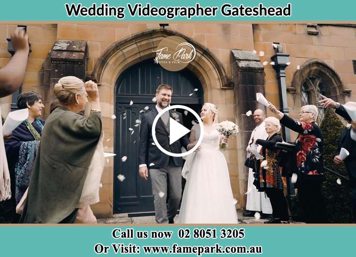 The newly weds walking through the well wishers Gateshead NSW 2290