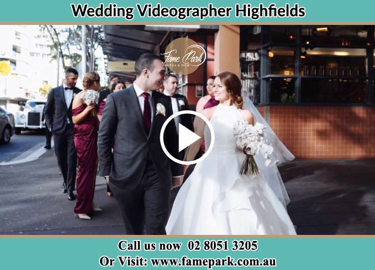 The Groom and the Bride walking in the street Highfields NSW 2289