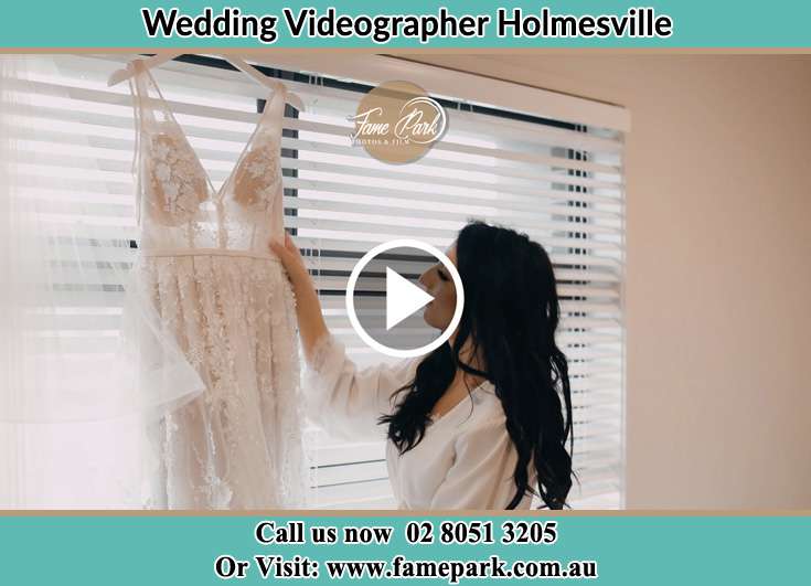 The Bride checking her wedding gown Holmesville NSW 2286