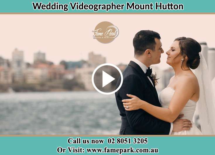 Bride and Groom kissed at the shore Mount Hutton NSW 2290