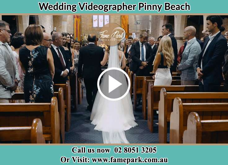 The Bride walking down the aisle with her father Pinny Beach NSW 2281