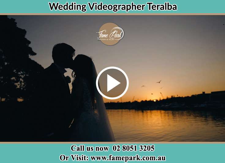 Bride and Groom kissed at the shore Teralba NSW 2284