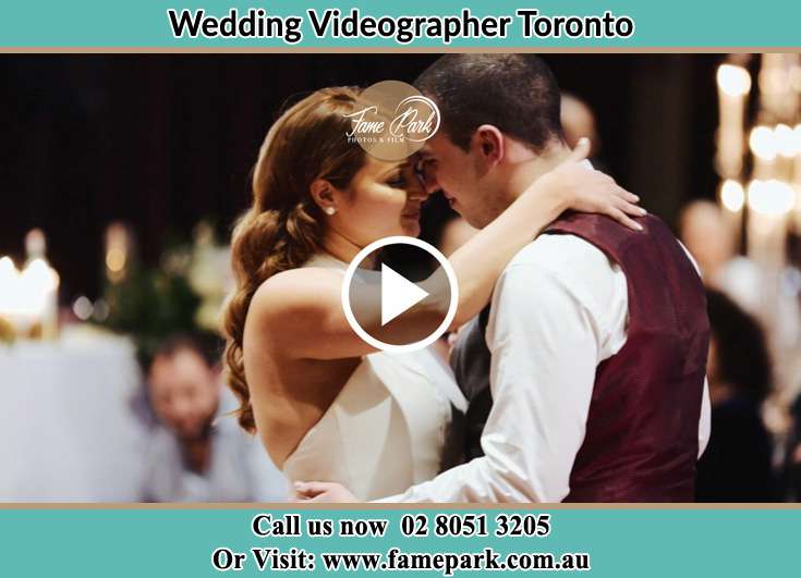 Bride and Groom looking at each other while dancing Toronto NSW 2283