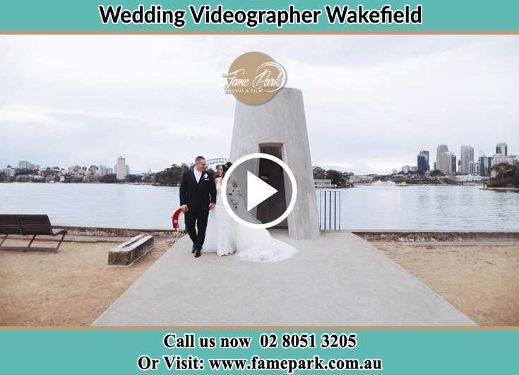 The newly weds walking near the shore Wakefield NSW 2278