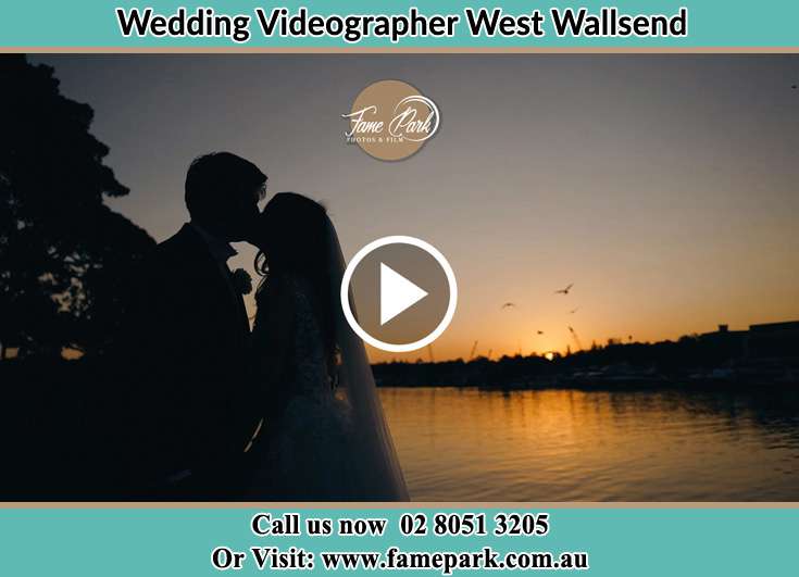 Bride and Groom kissed at the shore West Wallsend NSW 2286