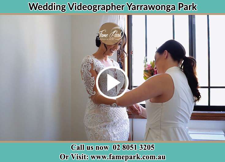 Bride getting ready through the help of her secondary sponsor Yarrawonga Park NSW 2264